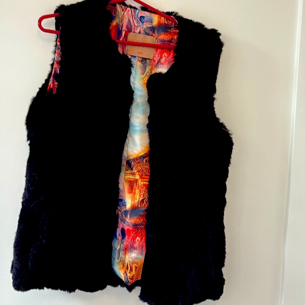 New rabbit fur vest never worn purchased in Florence Italy